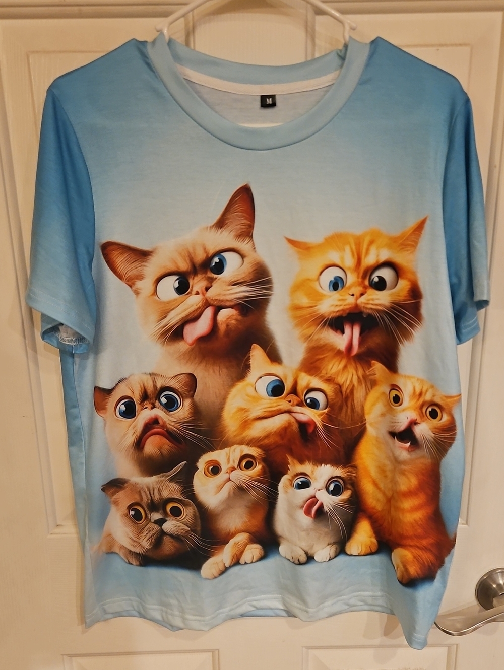 Light Blue Cat Graphic Tee with Playful Kittens
